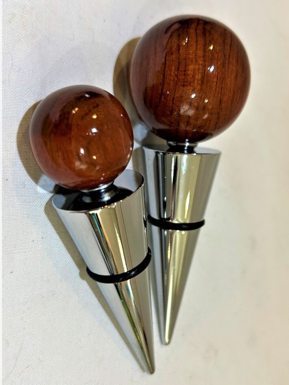 Pair of Brookstone Rosewood Wine Stoppers
